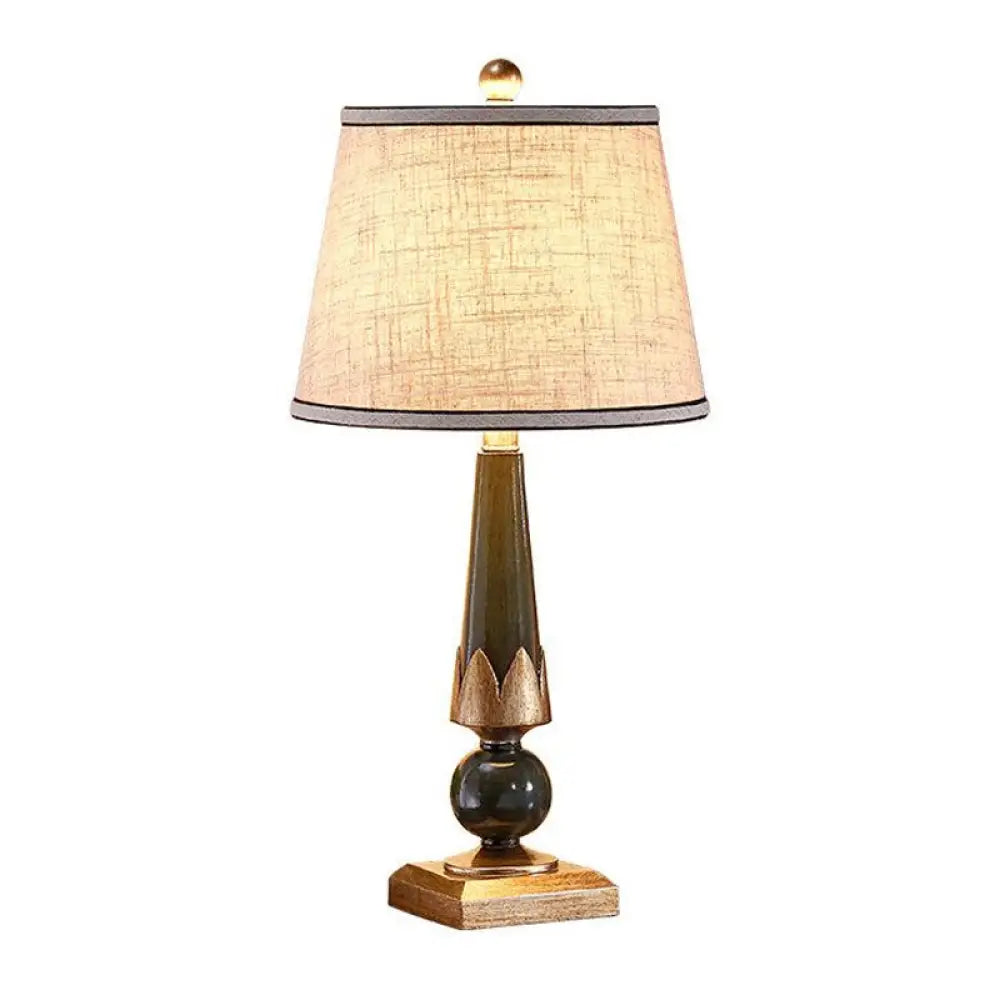 metal table lamps with a matte black finish for a sleek appearancemetal table lamps with a matte black finish for a sleek appearanceMargot - Sleek Tapered Drum Night Lamp - Minimalist Design