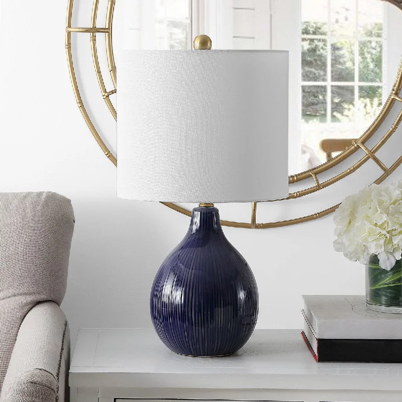 glass table lamps with a frosted surface for soft light diffusionglass table lamps with a frosted surface for soft light diffusionSafavieh Calrus Table Lamp - Blue