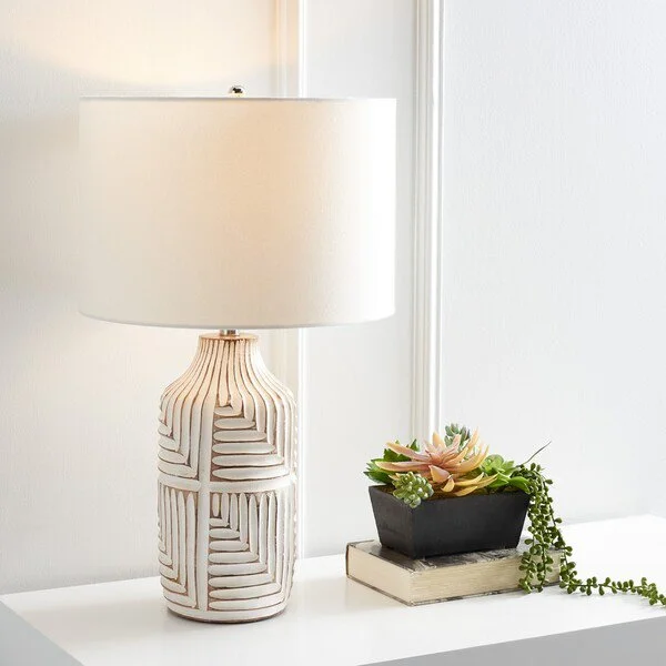 leather table lamps with a distressed texture for a rugged charmleather table lamps with a distressed texture for a rugged charmSafavieh Dione Table Lamp - Ivory