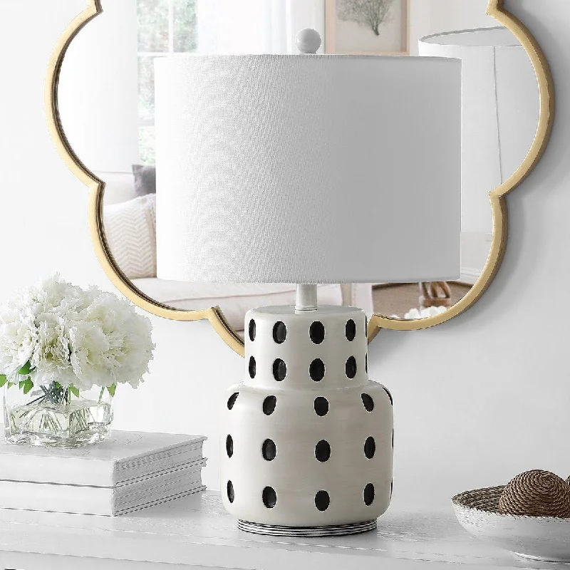 metal table lamps with a matte black finish for a sleek appearancemetal table lamps with a matte black finish for a sleek appearanceSafavieh Kencia Table Lamp - Cream