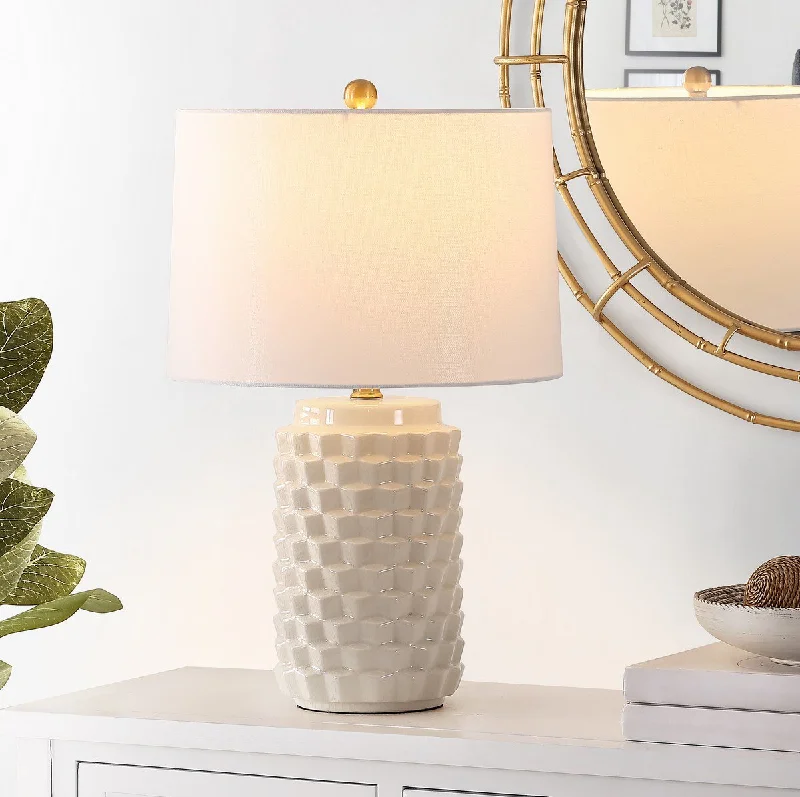wooden table lamps with natural grain for a warm and organic feelwooden table lamps with natural grain for a warm and organic feelSafavieh Weldon Ceramic Table Lamp - Ivory