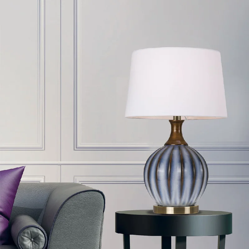 metal table lamps with a matte black finish for a sleek appearancemetal table lamps with a matte black finish for a sleek appearanceYoni White and Brass Ridged Bottle Table Lamp